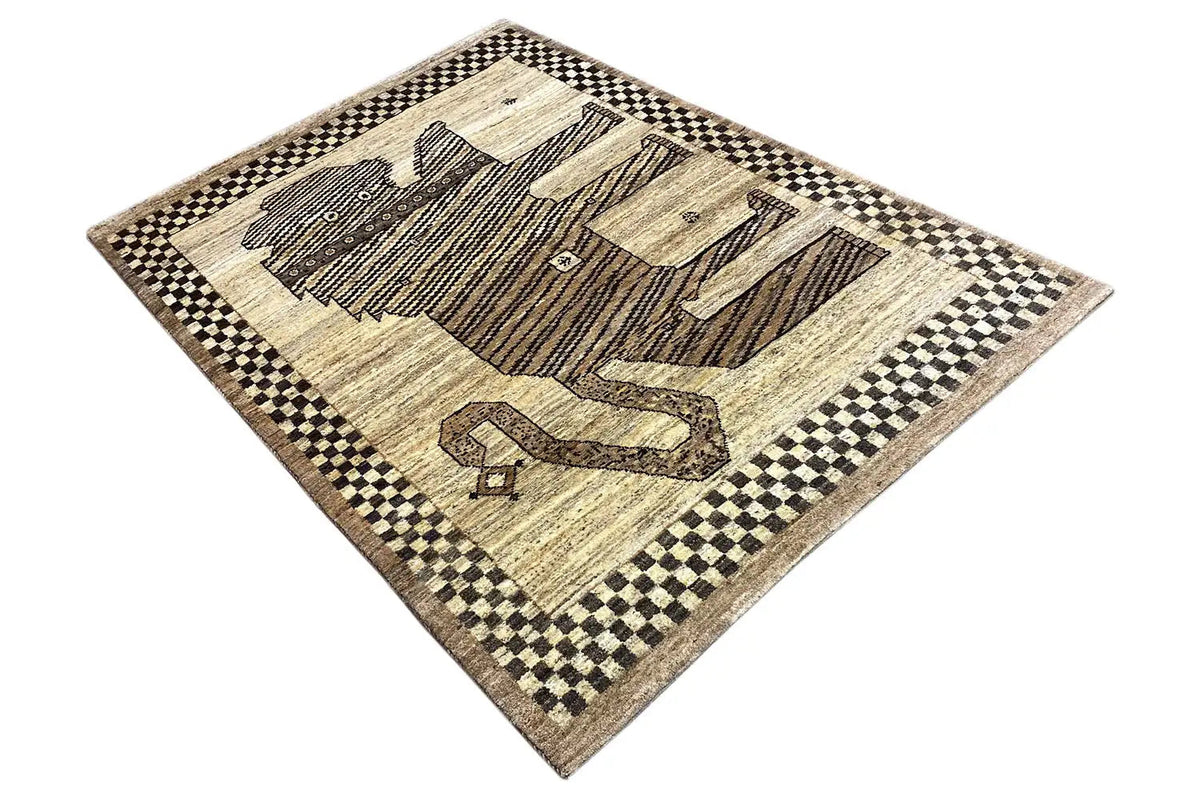 Beige and dark brown gabbeh rug with an animal motif and black-and-beige checkered pattern