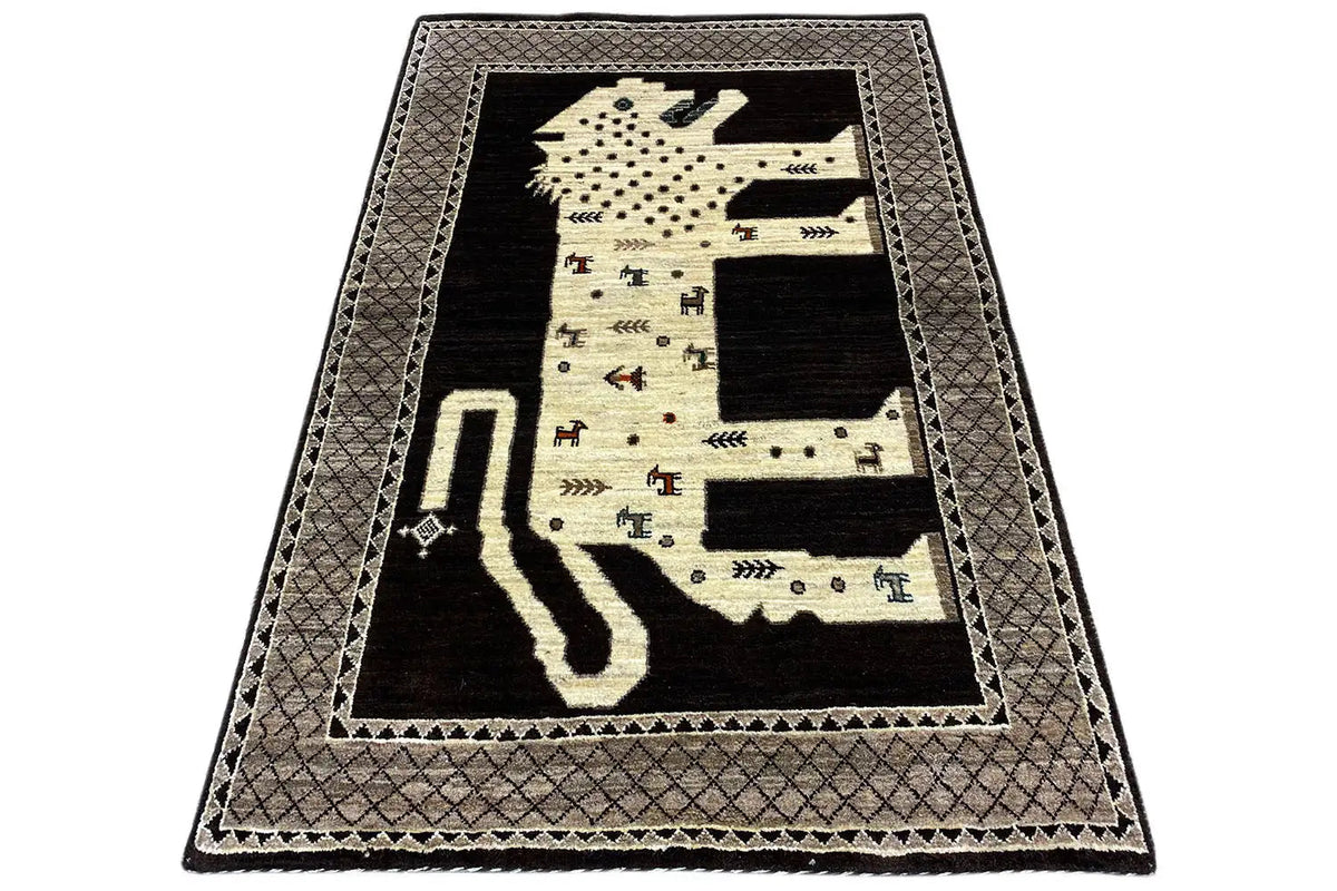 Flat oriental rug with lion motif, dark background, beige medallion border