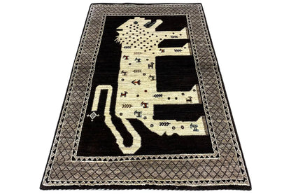 Flat oriental rug with lion motif, dark background, beige medallion border