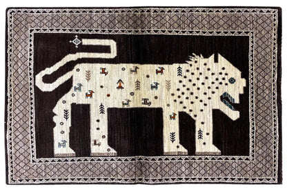 Oriental rug with lion motif, dark background with beige patterns and decorative border