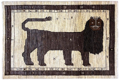 Gabbeh rug with lion motif, high-contrast silhouette, and dark border trim