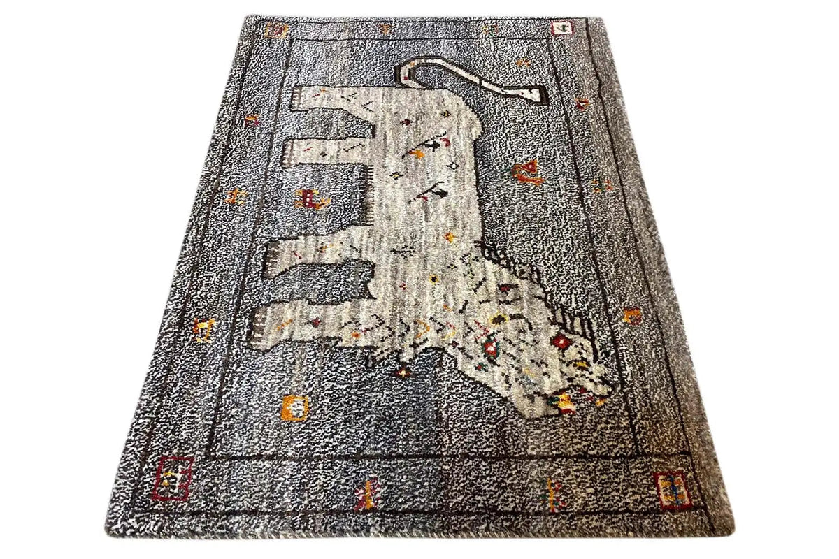 Gabbeh rug in trapezoidal view with lion motif, gray and multicolored border
