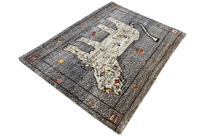 Gabbeh rug at an angle: lion motif and ornaments, gray, colorful accents