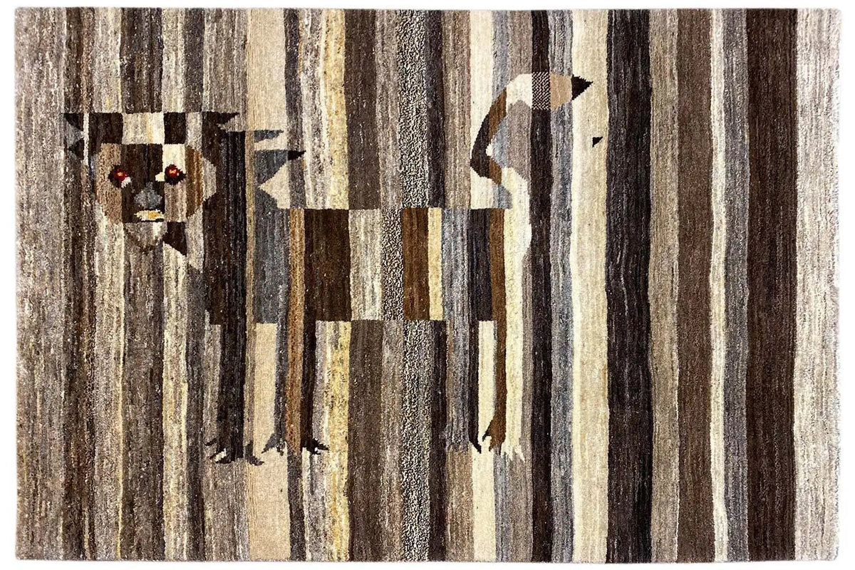 Gabbeh rug with a lion motif and vertical stripes in brown, beige, and black.