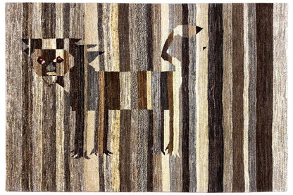 Gabbeh rug with a lion motif and vertical stripes in brown, beige, and black.