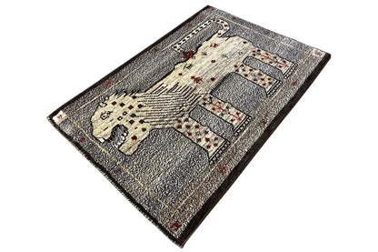 Gabbeh rug Lion Gabbeh 93x66 cm: diagonal view with gray-cream figures