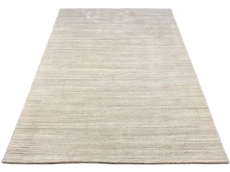 Large beige Gabbeh loom rug with fine line weave, 170×242 cm