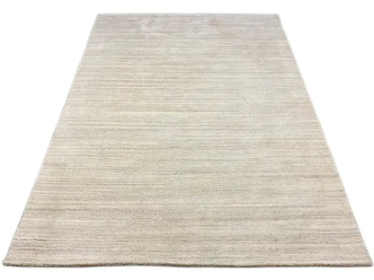 Large beige Gabbeh loom rug with fine line weave, 170×242 cm
