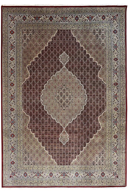 Square-look rug with a brown background and a light floral ornamental medallion