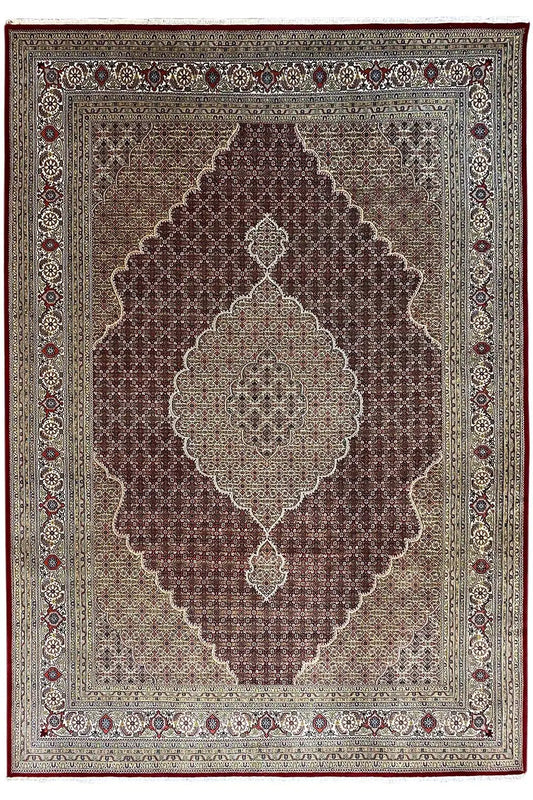 Square-look rug with a brown background and a light floral ornamental medallion