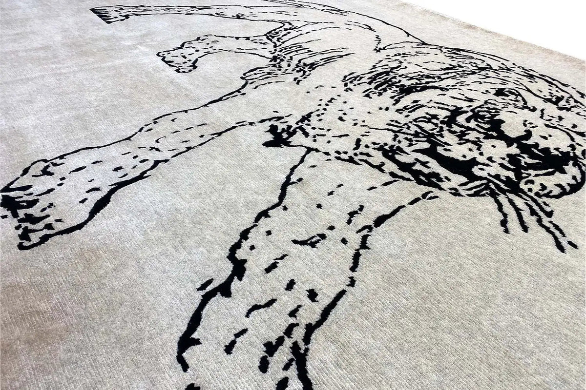 Designer rug: Close-up of dog figure motif in black on a light gray background