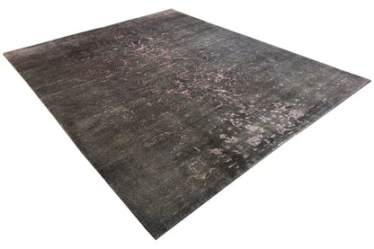 Designer rug, rectangular, dark gray with a geometric abstract pattern in lilac accents