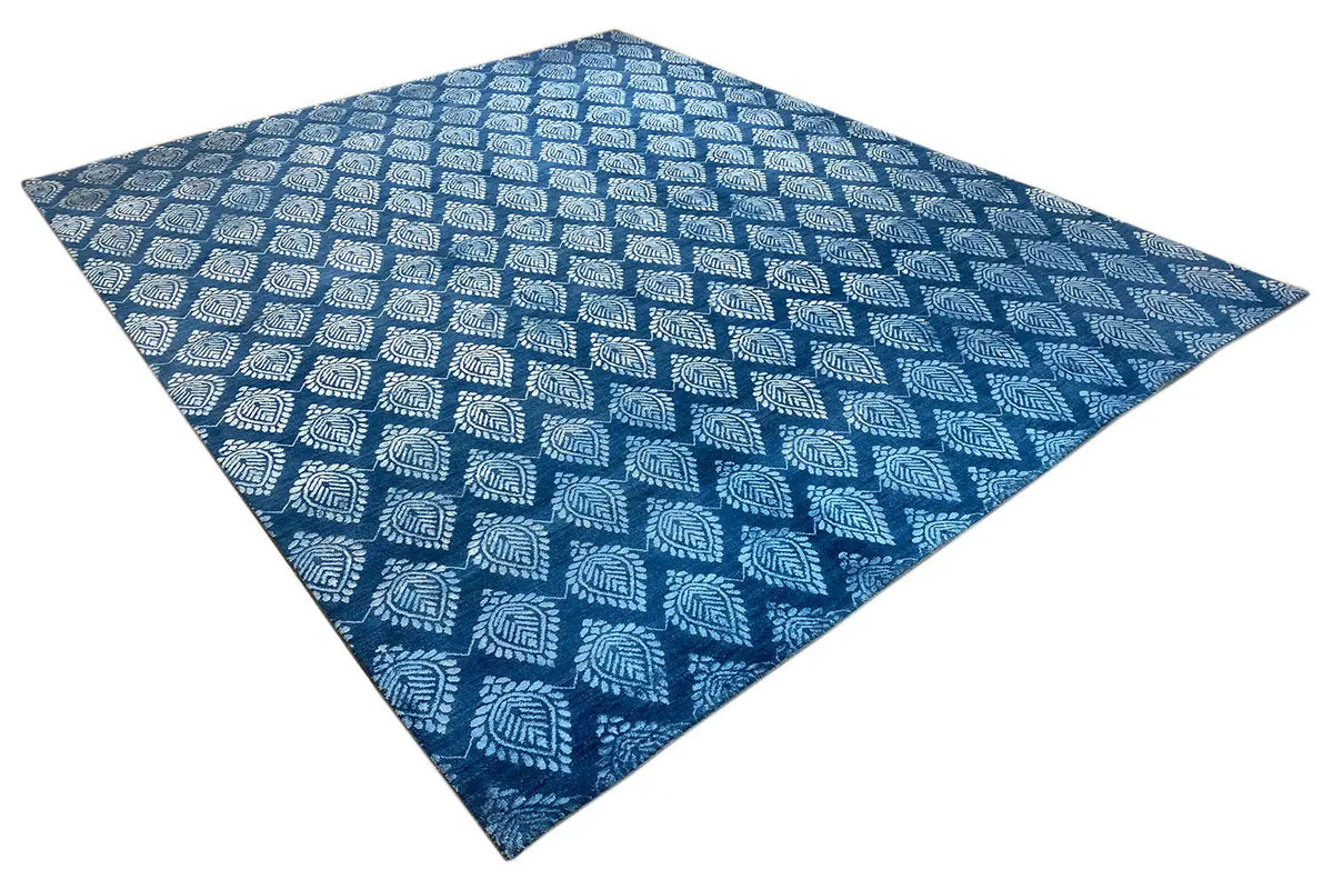 Designer rug with a diamond pattern, blue with a small geometric design