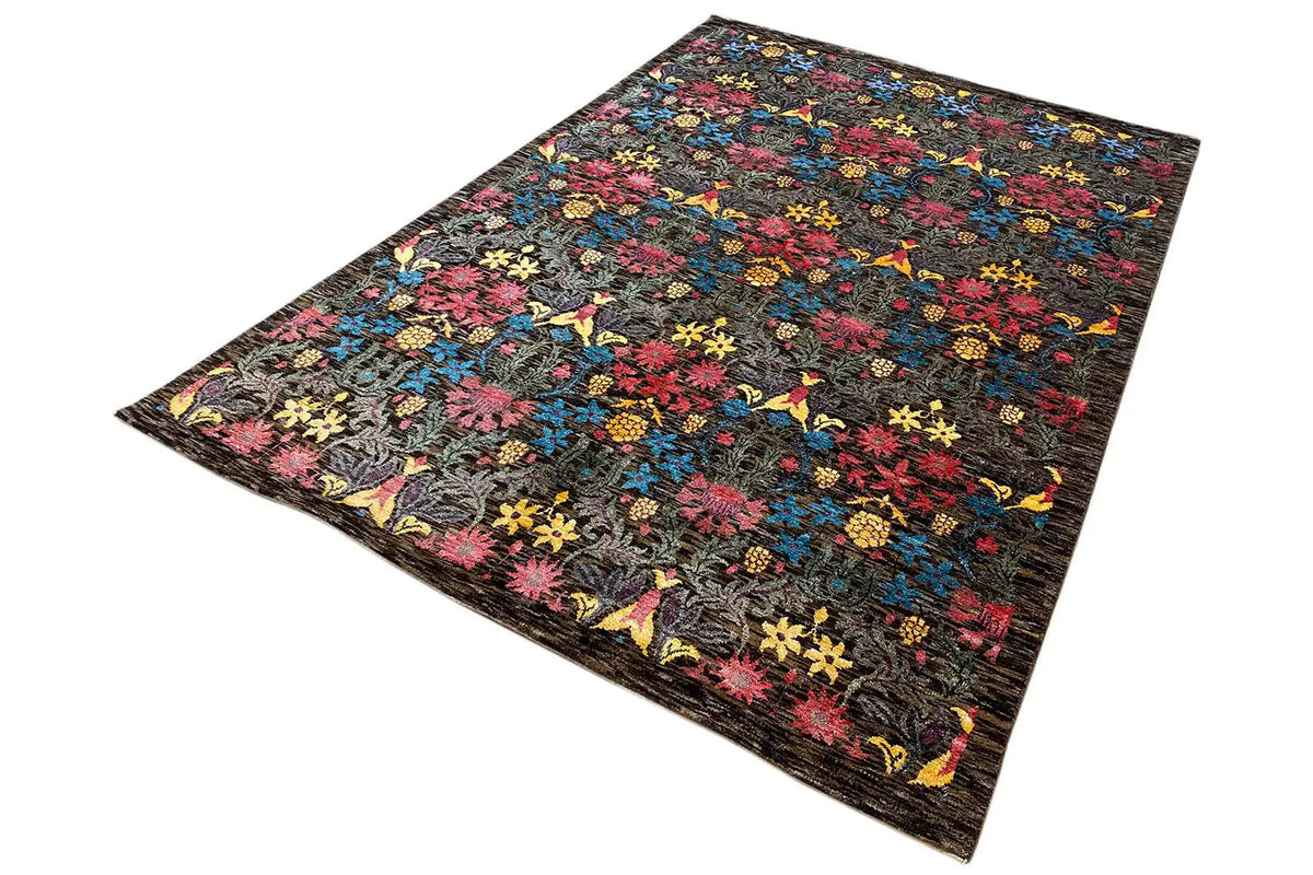 Rectangular rug with a colorful floral pattern on a dark background, narrow border
