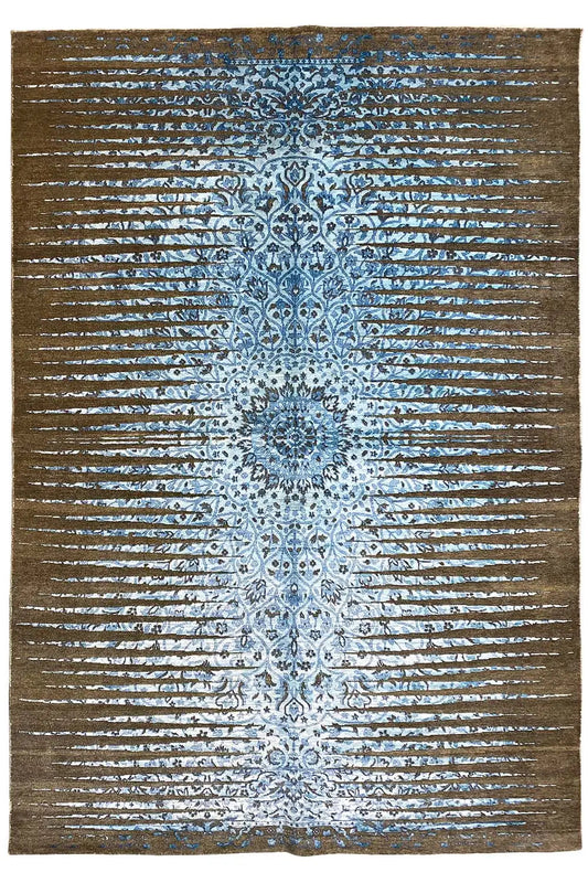 Designer rug with a blue-brown pattern, symmetrical central motif, and fine stripes