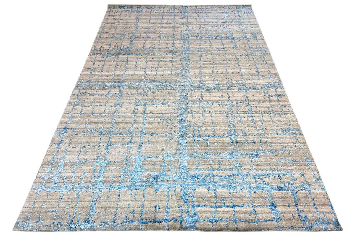 Large-format rug 310x197 cm with a beige background and blue abstract linear grid