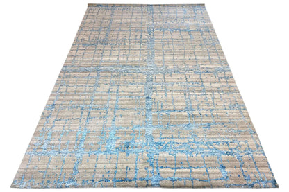 Large-format rug 310x197 cm with a beige background and blue abstract linear grid