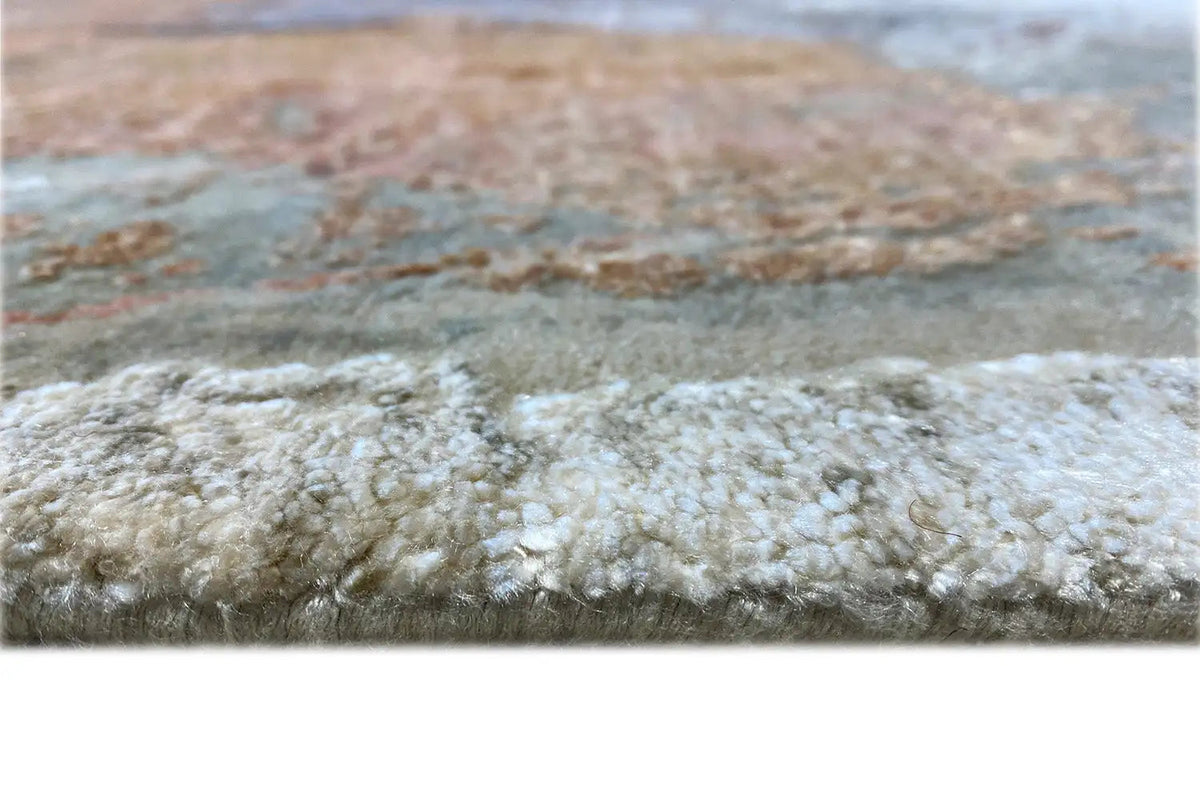 Close-up of designer rug: short pile with mottled gray and light shading