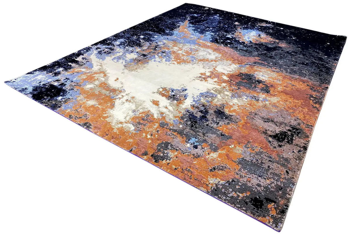 Designer rug, abstract design in black, blue, and orange, rectangular