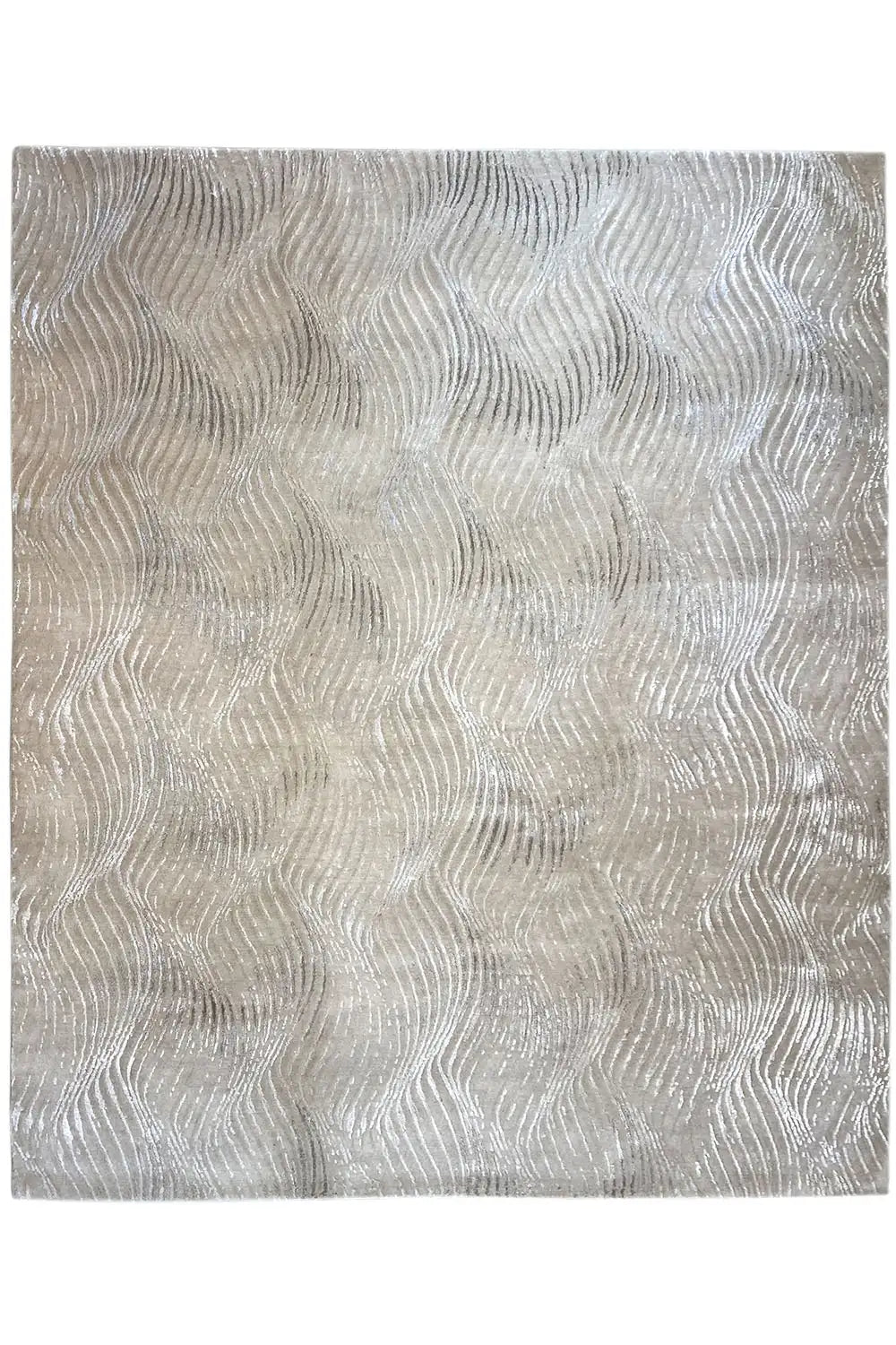 Pascal Walter “Waves”: Light beige rectangular rug with a delicate wave pattern