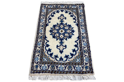 Rectangular Nain rug 62x40 cm with a blue-and-white pattern and fringes
