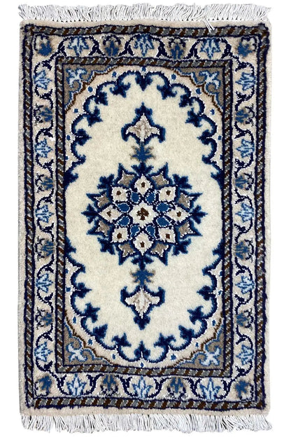 Rug 62x40 cm with blue ornamental pattern and fringes, rectangular
