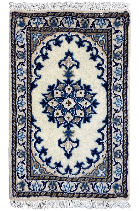 Rug 62x40 cm with blue ornamental pattern and fringes, rectangular