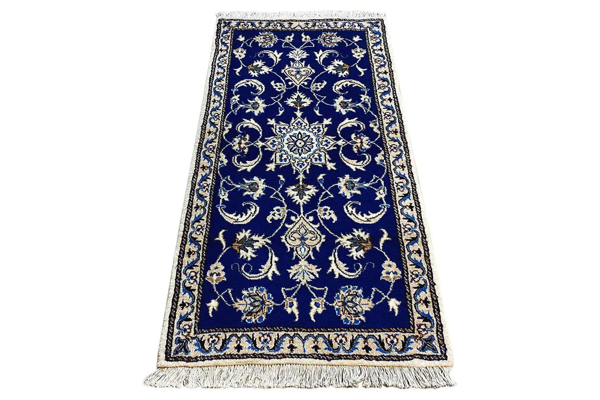 Nain oriental rug, rectangular, blue medallion design with decorative border and fringes