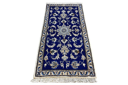 Nain oriental rug, rectangular, blue medallion design with decorative border and fringes