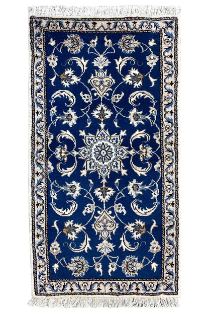 Nain oriental rug, rectangular, blue with a light ornamental pattern and fringes