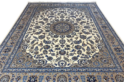Top view of a rug: cream background with a blue floral and vine ornament
