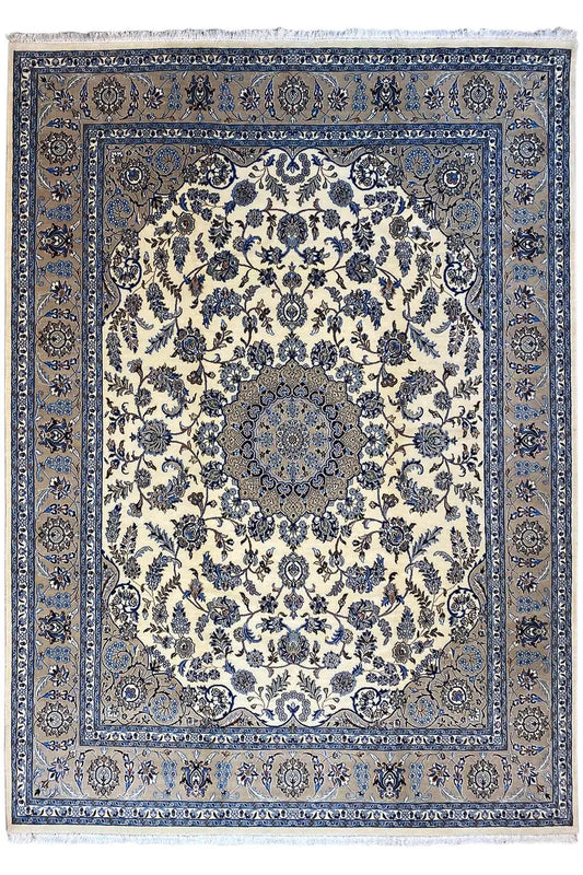 Large Oriental rug with a cream-colored field, blue border, and delicate pattern