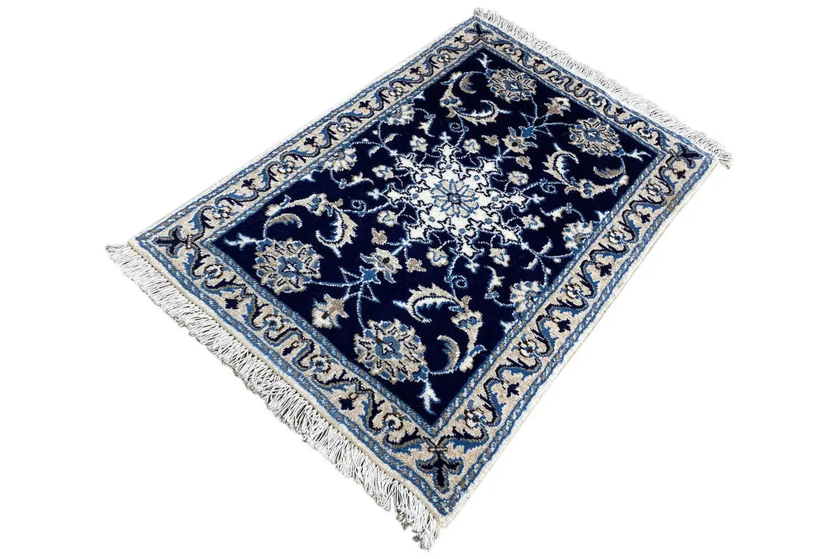 Nain rug, rectangular, dark blue with floral patterns, fringes on all sides