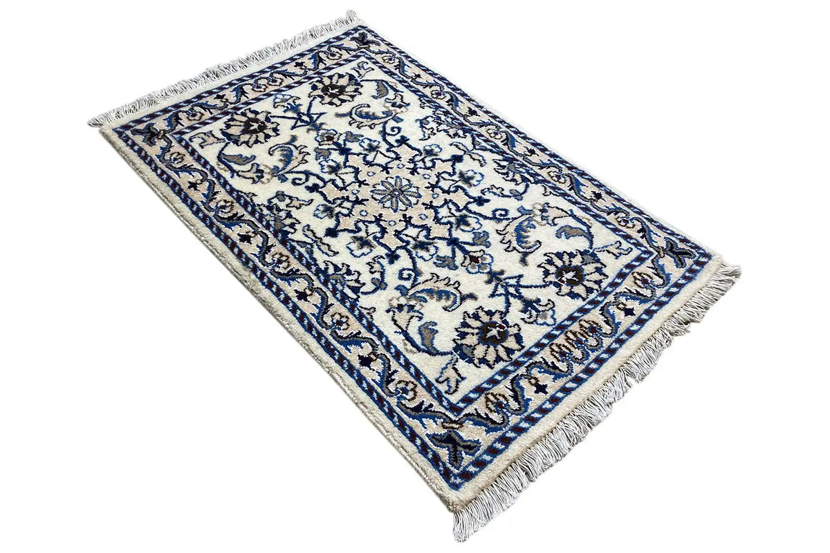 Nain rug 85x60 cm, angled view, blue ornament, fringes
