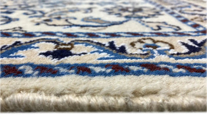 Nain rug edge with fringes, blue pattern on a light background (detail)