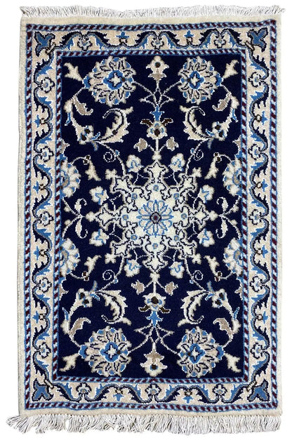 Rug 88x60 cm: dark blue ornamental pattern, light accents, fringe