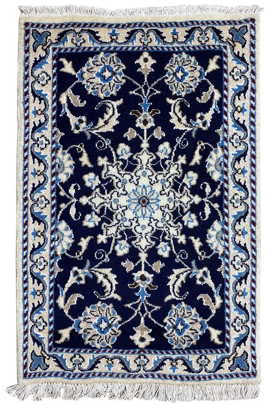 Rug 88x60 cm: dark blue ornamental pattern, light accents, fringe