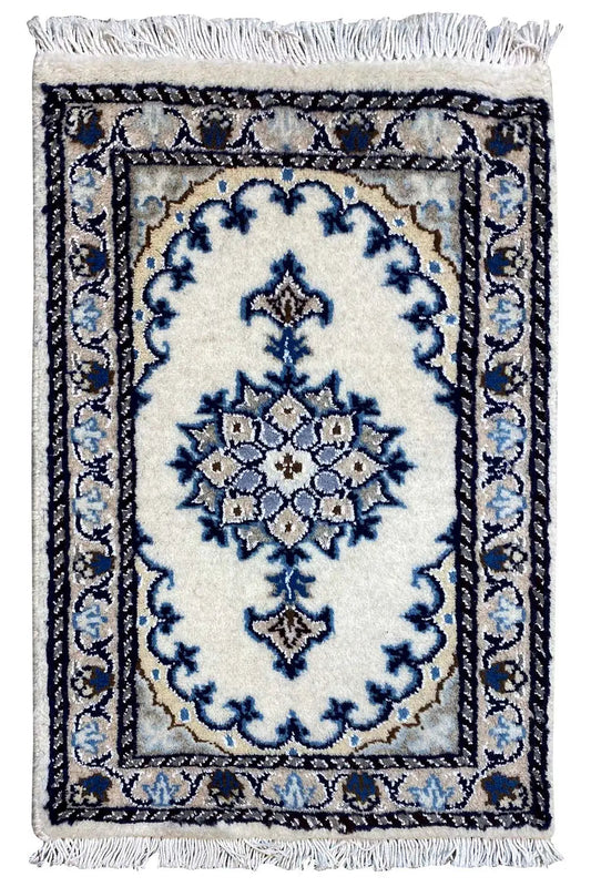 Nain rug 57×37 cm with a blue-and-white ornamental pattern and fringes
