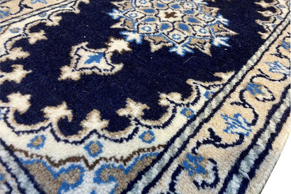 Nain rug 64x39 cm, detail of the ornamental pattern in dark blue and light blue