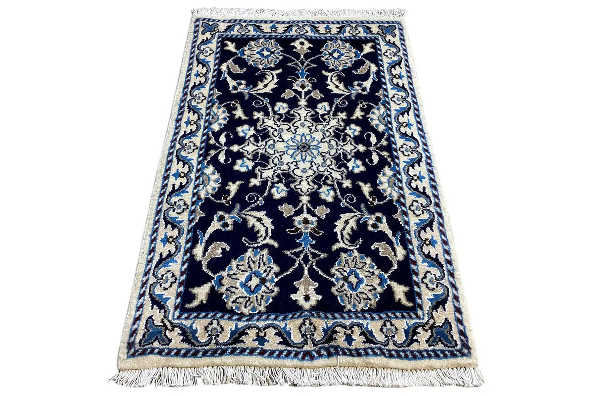 Rug 88x59 cm, blue with white baroque patterns and fringes along the edges