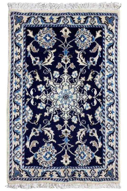 Rug 88x59 cm with a blue background and gold/white ornaments, with fringes