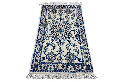 Nain rug (93x56 cm), blue-and-white borders, rectangular, with fringes
