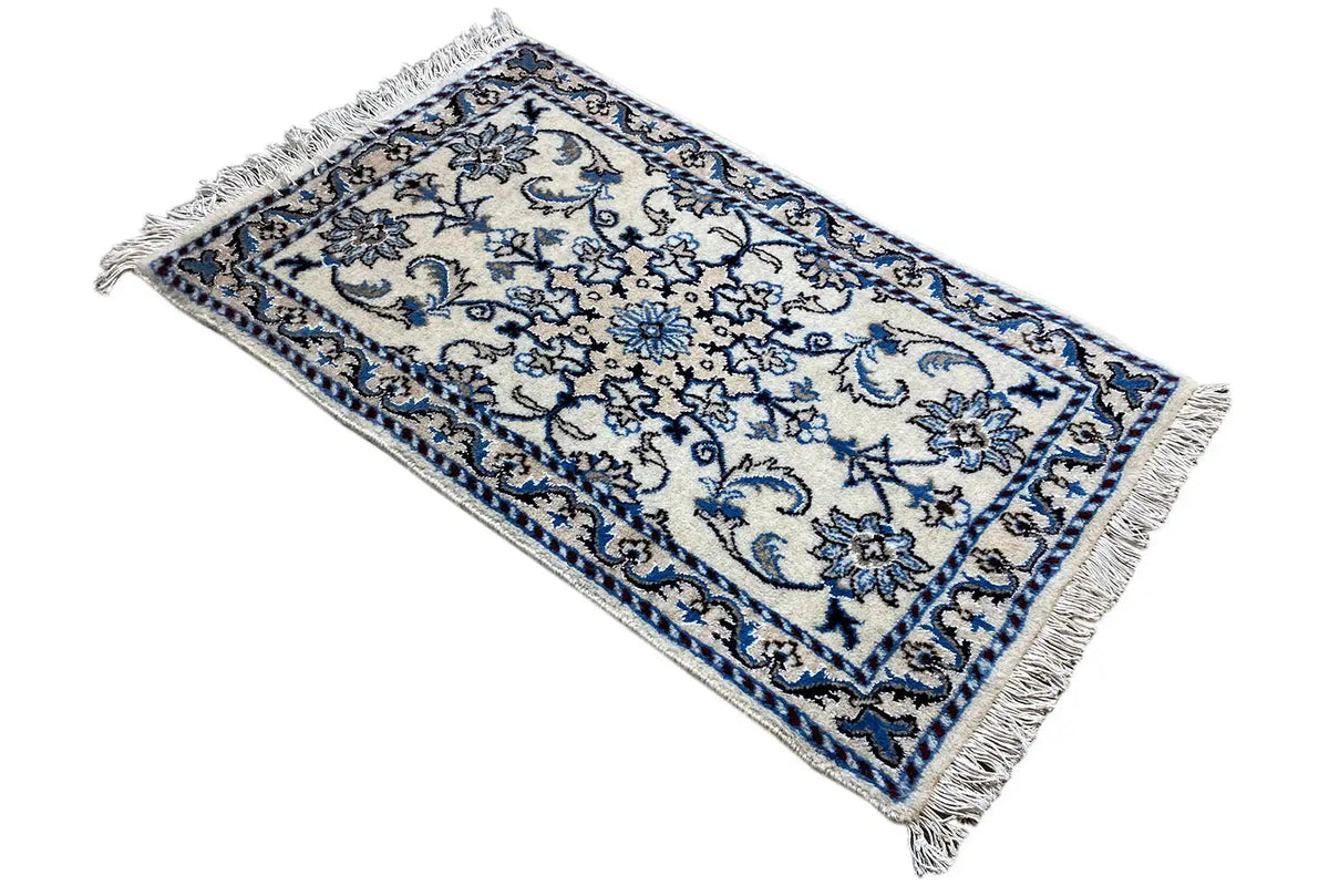Nain rug (93x56 cm), blue-and-white ornamental design, rectangular, with fringes