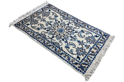 Nain rug (93x56 cm), blue-and-white ornamental design, rectangular, with fringes