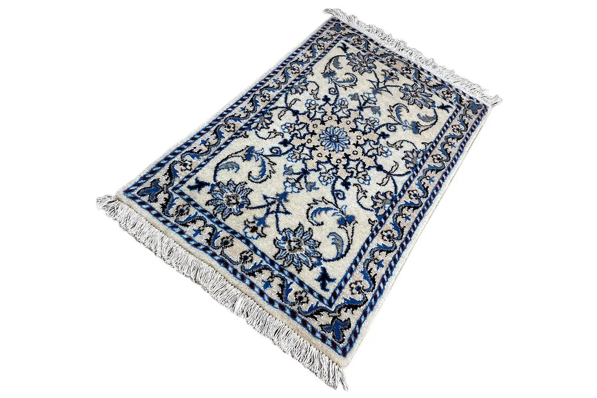 Nain rug (93x56 cm), blue-and-white medallion pattern, rectangular, with fringes