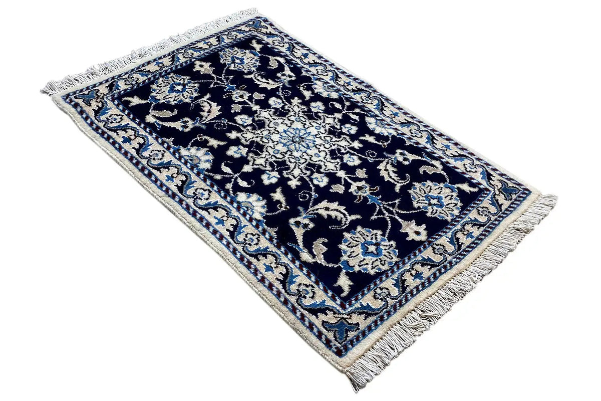 Nain rug 90x61 cm viewed lying flat, fringes at the edges, blue ornament