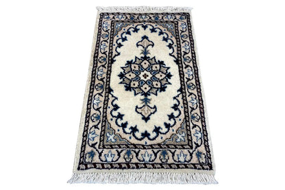 Nain rug (65x39 cm), rectangular, blue-and-white ornamental design with fringes