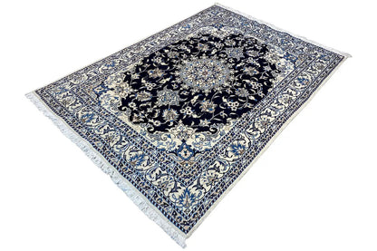 Nain rug 205×146 cm, unfolded, with a dark central medallion and borders