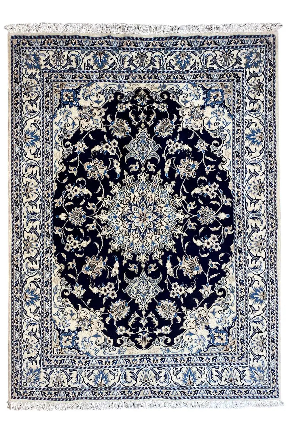 Nain rug 205×146 cm with blue-and-white ornamentation and a dark center