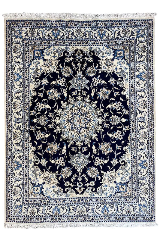 Nain rug 205×146 cm with blue-and-white ornamentation and a dark center